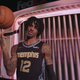 Memphis Grizzlies guard Ja Morant posing in the team’s new Soul City Edition Nike uniforms.
